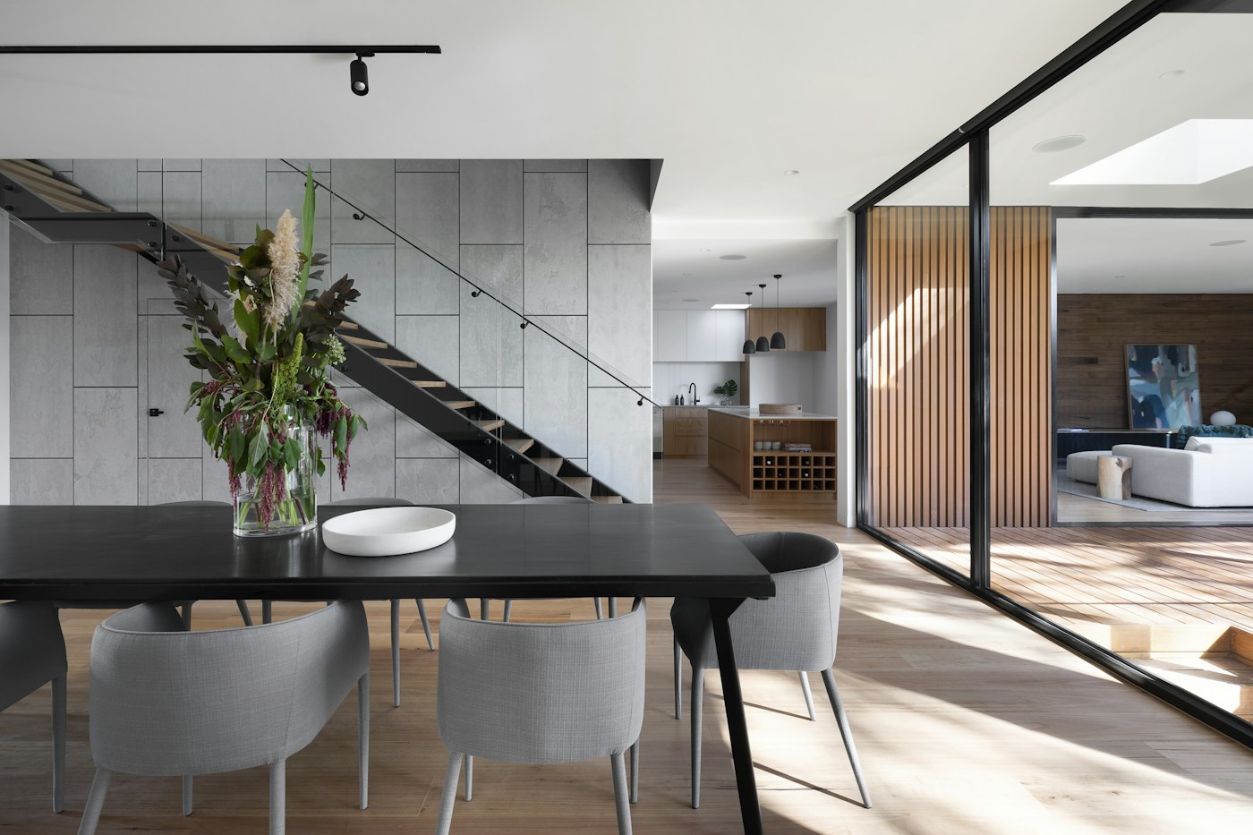 Bright contemporary living space with large windows